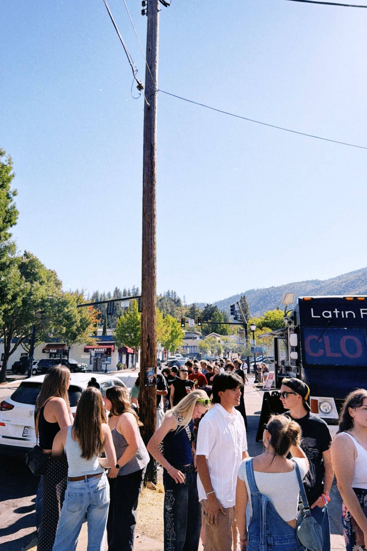 Shoppers lining the street racks outside a FoundF1rst pop-up